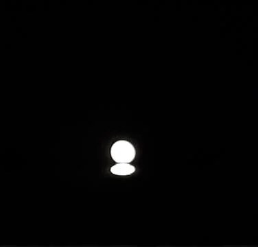 In the evening the moonlight shone in the eastern sky and the sky was clear. Stock Photos