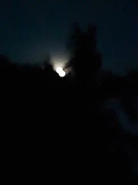 In the evening the moonlight shone in the eastern sky and the sky was clear. Stock Photos