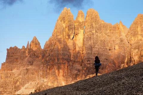 Evening mount Croda da Lago from passo Giau and hiker Stock Photos