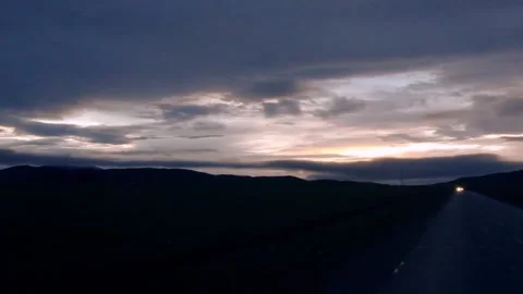 Evening mountain road Stock Footage 235132936