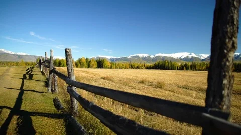 Evening in the mountains. the sun is low, beautiful light, in the foreground a Stock Footage 102433787
