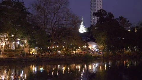 Evening night life across the ping river Stock Footage 123725553