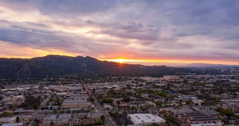 Evening to Night Sunset Behind Mountain Aerial Motion Timelapse (Hyperlapse) Stock Footage 128993202