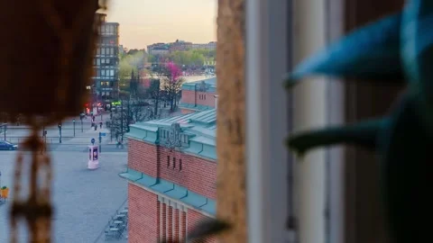 Evening to night timelapse viewed through a window, spring colors in Helsinki Stock Footage 337626361