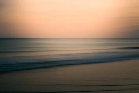 Evening ocean scene with soft waves and a serene horizon, abstract Stock Photos