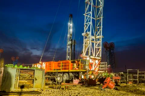 In the evening of oilfield derrick Stock Photos