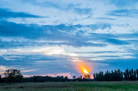 Evening over the field Stock Photos