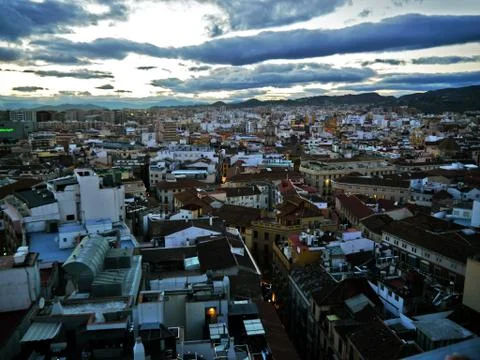 Evening over the rooftops of Málaga, Spain Stock Photos
