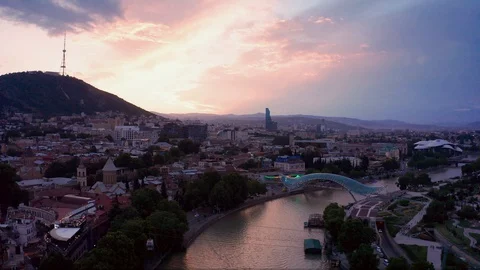 The evening panorama and flight over of the old town in the old district of Stock Footage 129302194