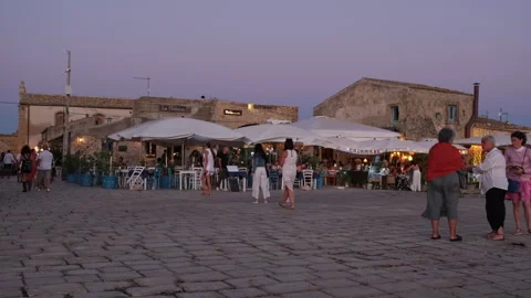 Evening panorama of Marzamemi with the characteristic locals Stock Footage 284748341