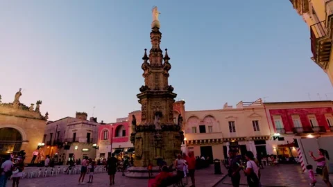 Evening panoramic sweep across Piazza Salandra in Nardò Stock Footage 315937362