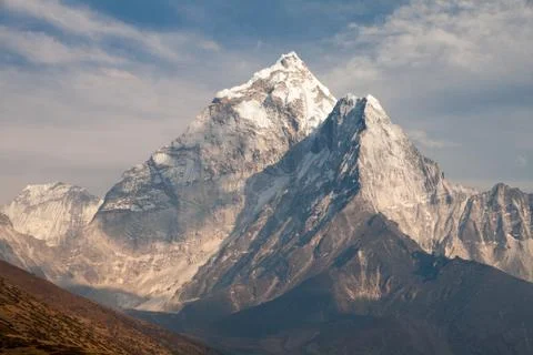 Evening panoramic view of mount Ama Dablam with beautiful sky on the way to E Stock Photos