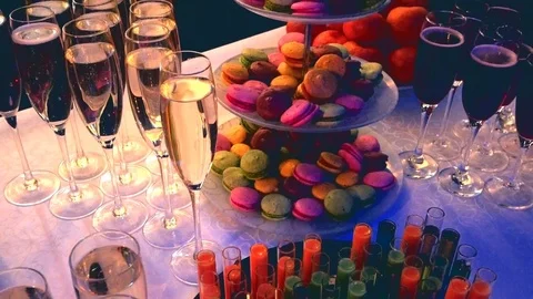 Evening party table with macaroons Video stock 83610445