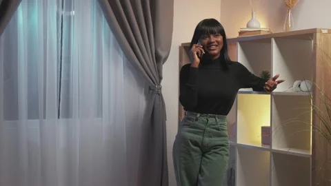 Evening phone call mobile conversation woman home Stock Footage 201668016