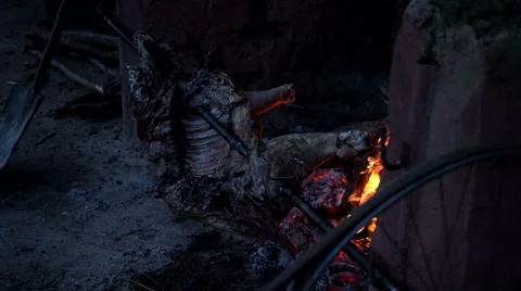 Evening, pig on a spit. Stock Footage 68422404