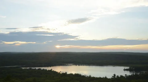Evening pre-sunset scene lake, forest, mountains, clouds time lapse wide HD1080 Stock Footage 39720590