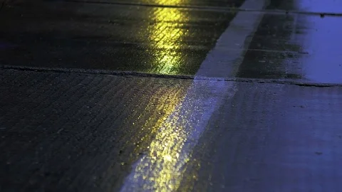 Evening rain drips onto the concrete surface Stock Footage 78065753