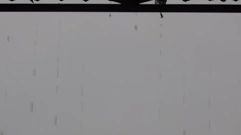 Evening rain water drops falling from roof Stock Footage 278874139