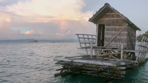 Evening Rainbow and Floating Hut 스톡 동영상 106456113