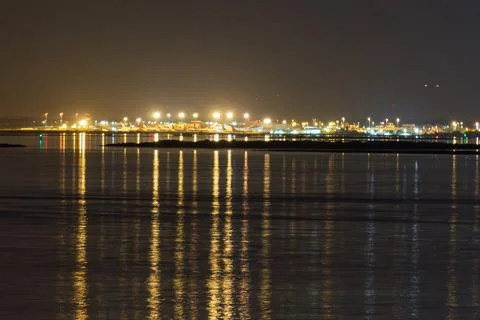 Evening reflections over Faro's peaceful waters Stock Photos