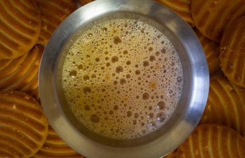 Evening refreshment with tea and biscuits. Tea time with crackers. Stock Photos