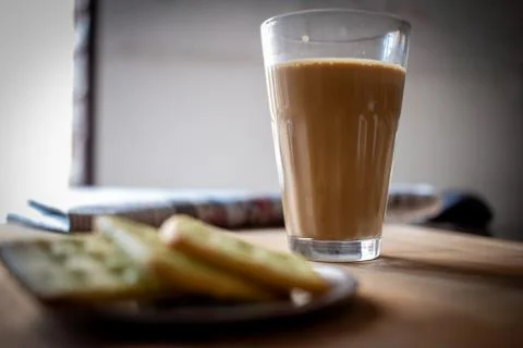 Evening refreshment with tea and biscuits. Tea time with crackers. Stock Photos