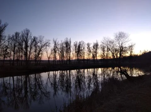 Evening on the river Stock Photos
