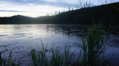 Evening on the river, twilight on the river Stock Photos