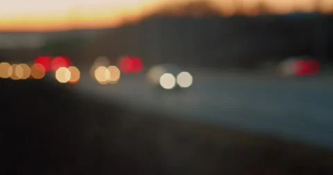 Evening road lights blurred the bokeh of cars in traffic jams on the road Stock Footage 246568549