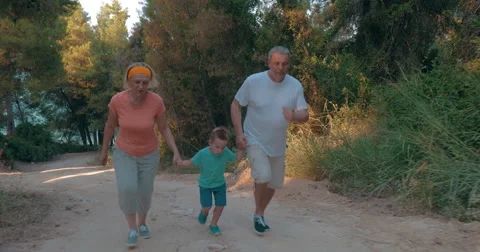 Evening run together in the woods Stock Footage 61810671