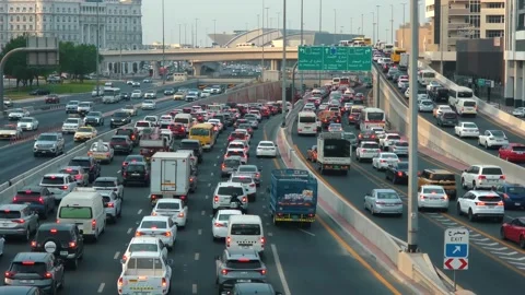 Evening rush-hour congestion on the road connecting Dubai and Sharjah 動画素材 345626828