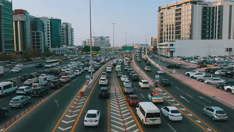 Evening rush-hour congestion on the road connecting Dubai and Sharjah 動画素材 345626896