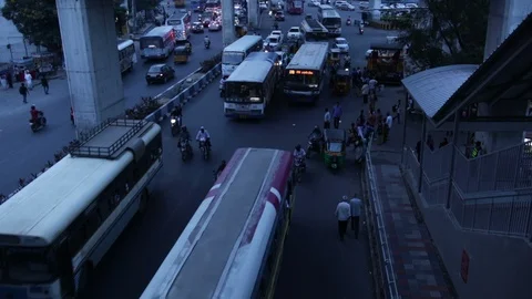 Evening-rush-hour-traffic-bus-stop-near-metro-station Stock Footage 95944064