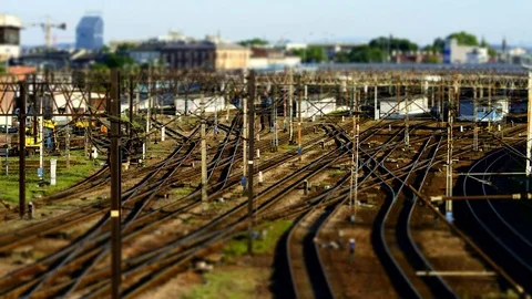 Evening rush of trains entering and leaving the station - tilt-shift Stock Footage 78914175