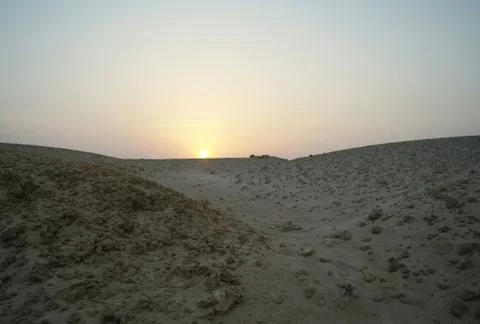 Evening scene in desert Stock Photos
