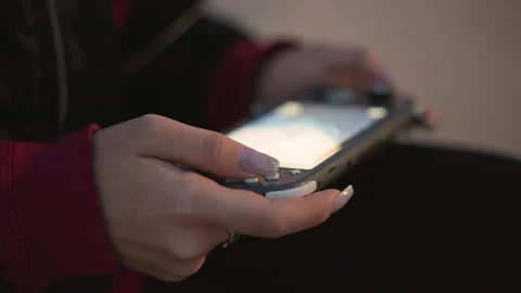 Evening Scene Of Relaxed Hand Solving Mobile Game Puzzle, Serene Dusk Stock Footage 333642379
