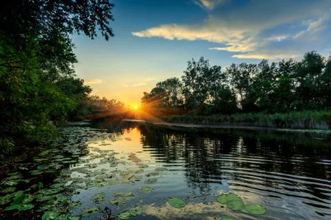 Evening scene on river Stock Photos