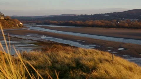 Evening scene where the river meets the sea Stock Footage 242657831