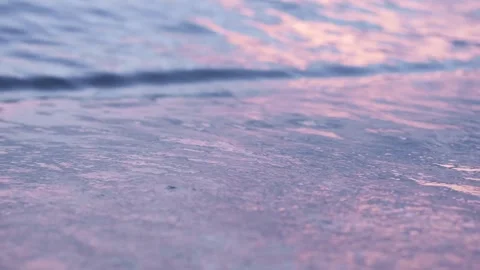 Evening seashore with wave close up. Calm night ocean water waves splashing Stock Footage 276611830