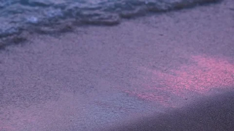 Evening seashore with wave close up. Calm night ocean water waves splashing Stock Footage 279550859