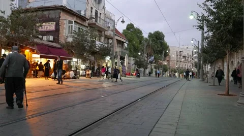 Evening Shoppers on Train Tracks at Jerusalem's Machane Yehuda Market Stock Footage 55609146