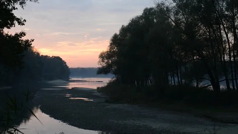 Evening at the shore of the danube river in austria Stock Footage 126987690