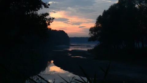 Evening at the shore of the danube river in austria Stock Footage 126987897