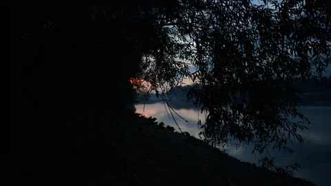 Evening at the shore of the danube river in austria Stock Footage 126987962