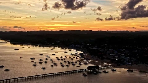 Evening shoreline timelapse featuring pier and boats in Philippines Stock Footage 336032879