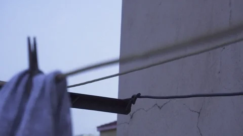 Evening Shot of some clothes hanging | 4K Stock Footage 92462138