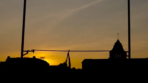 Evening silhouette of a Professional Olympic Pole Vault Athlete Training &amp; Stock Footage 140466941