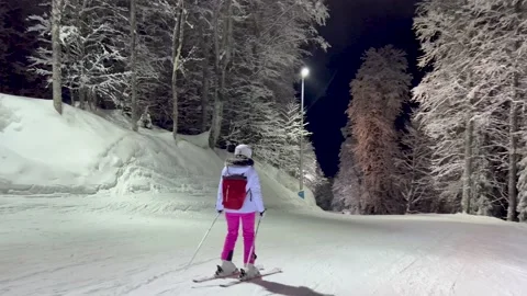 Evening Skiing On Lighted Slope With Snow Covered Trees With Frost In Fairy Tale Stock Footage 221420629