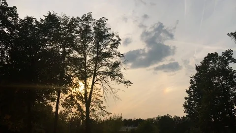 Evening sky and warm sunset, trees 2 Stock Footage 94776645