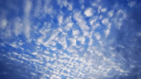 Evening sky with beautiful altocumulus clouds. Timelapse Stock Footage 147621069